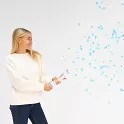Vystřelovací konfety modrá kolečka 28 cm