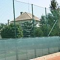 Zástěna na tenisový kurt EKONOM - 65% zastínění, rozm. 12x2 m (barva zelená) - rašlovaný úplet (PE)